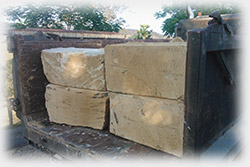 Large B-Grade sandstone blocks begin used by the Brisbane Council to build a massive retaining wall during the construction of the Gateway bridge project.