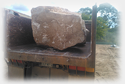 Rock Haulage of Massive Random Sandstone Boulders direct from the sandstone quarry on the Sunshine Coast