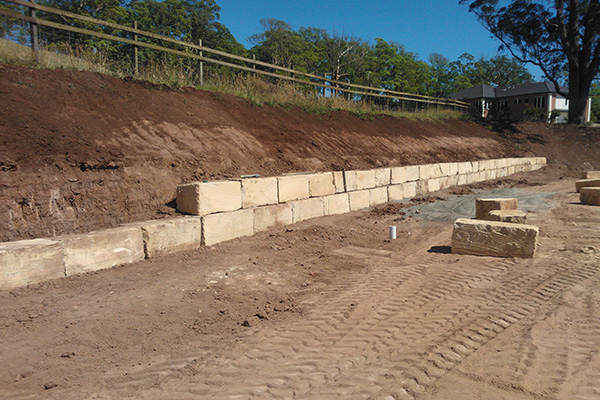A-Grade Sandstone Retaining Wall being constructed