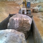 Huge Random Sandstone Boulders Being Loaded